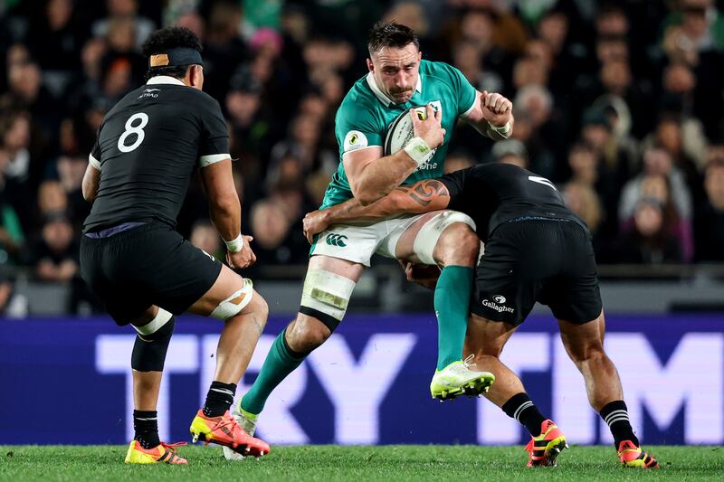 Ireland's Jack Conan is tackled by New Zealand's Codie Taylor. Photograph: Ben Brady/Inpho