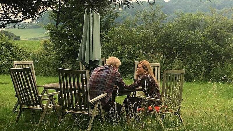 Downing Street partners: Boris Johnson and Carrie Symonds in the photograph that Johnson’s campaign team apparently released after the couple were recorded having a row at their flat in London