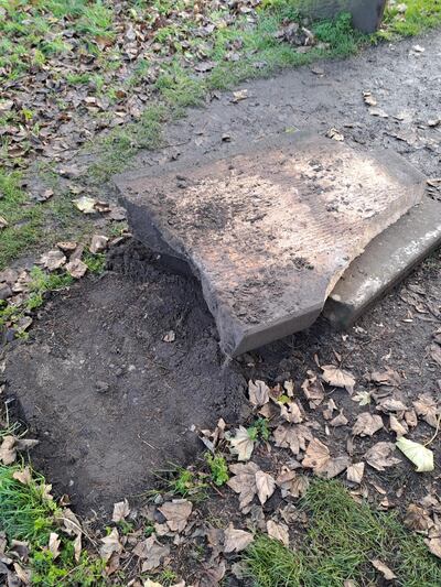 The damaged Scrooge gravestone. Photograph: West Mercia Police/PA Wire 
