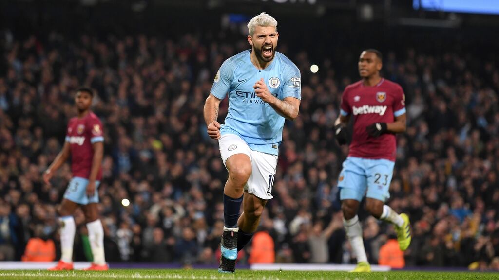 Sergio Agüero celebrates after scoring a penalty for Manchester City during the Premier League match against West Ham at the Etihad stadium. Photograph: Laurence Griffiths/Getty Images