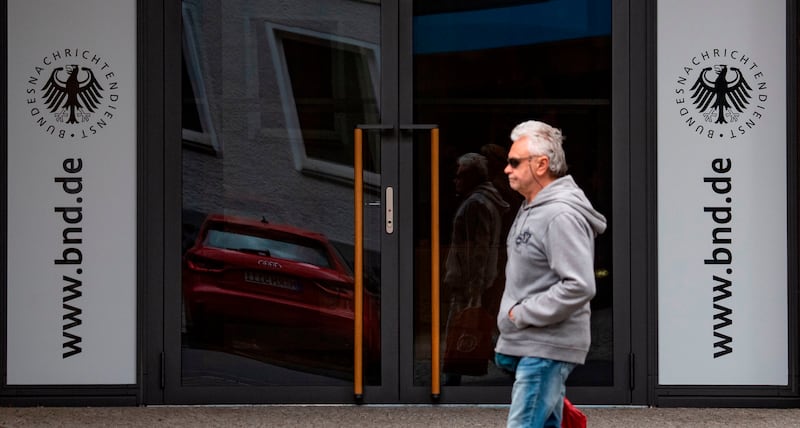 A man walks past the entrance of the visitors' centre at the headquarters of Germany's Federal Intelligence Service (BND) in Berlin. Photograph: John MacDougall/AFP via Getty Images