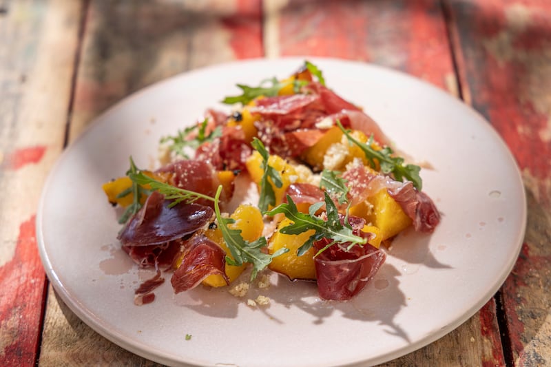 Mark Moriarty’s recipe for grilled peach and jamón salad with crostini and rocket