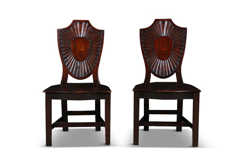 Pair of George III shield back hall chairs (€500-€800) at Adams interiors online auction