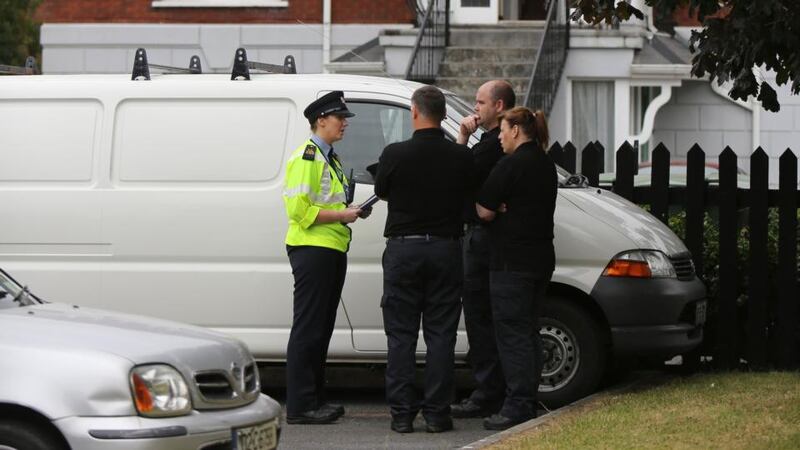 Gardai at the scene of the murder in Sandfield Mews, Ennis this  morning. Photograph: Eamon Ward