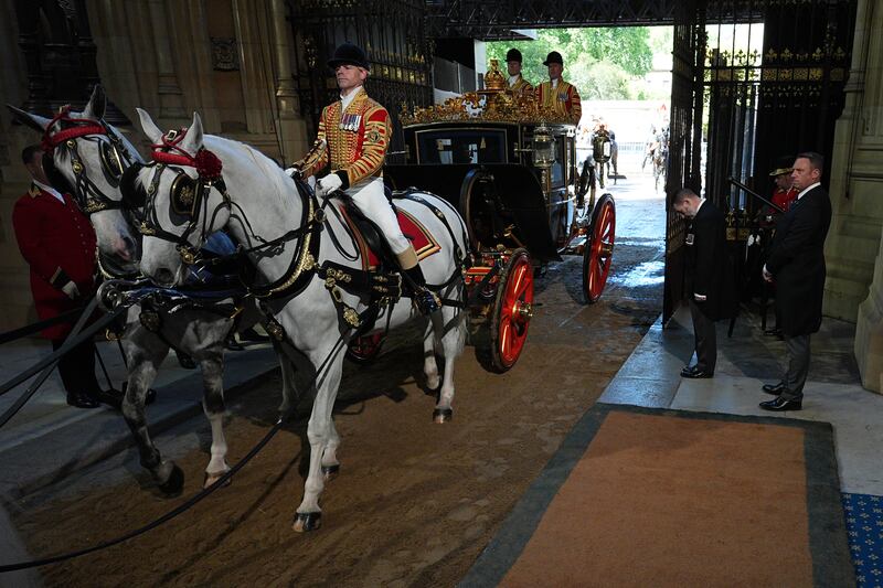 Britain's king Charles and queen Camilla arrive for the State opening of parliament in the House of Lords, at the Palace of Westminster in London. Photograph: Aaron Chown/PA Wire