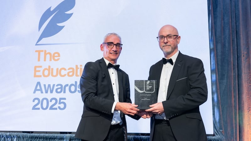 Joe Collins, awards judge, presents the best Erasmus programme to Prof Colin Fitzpatrick, University of Limerick