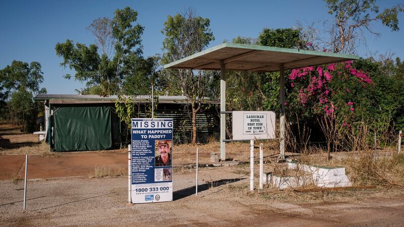 Eight months after he disappeared, a missing person sign remains outside the Larrimah, Australia, home of Paddy Moriarty. Photograph: Adam Ferguson/The New York Times