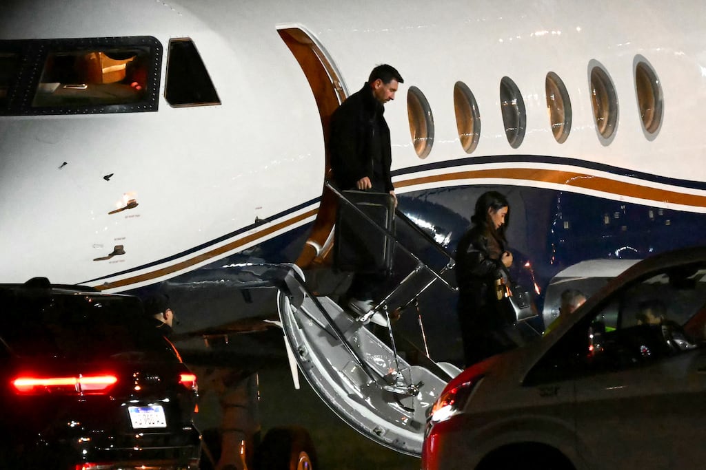 Argentine football star Lionel Messi and his wife Antonela Roccuzzo arrive in Argentina after Jorge Messi's death. Photograph: Luis Robayo/AFP via Getty