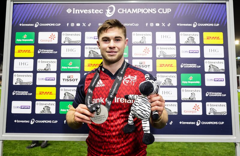 Munster’s Jack Crowley with the Investec Player of the Match Award. Photograph: Laszlo Geczo/Inpho

