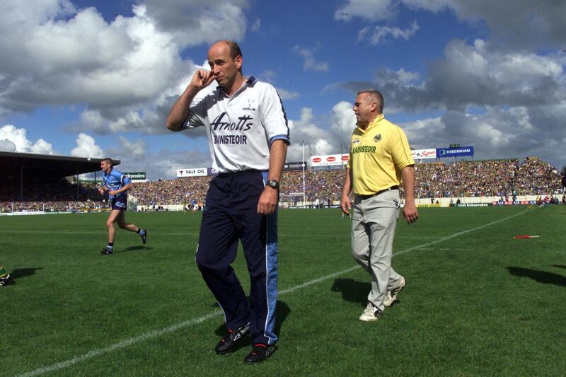Dublin manager Tommy Carr (left) and Kerry counterpart Páidí Ó Sé during the 2001 All-Ireland SFC quarter-final at Semple Stadium, Co Tipperary. Photograph: Billy Stickland/Inpho