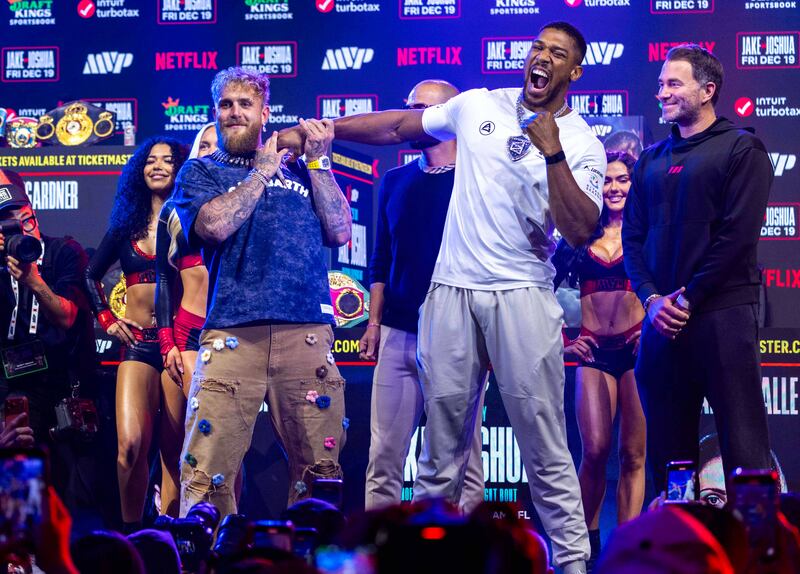 Jake Paul (left) and Anthony Joshua face off ahead of their heavyweight bout in Miami on Friday. Photograph: DA Varela/PA Wire