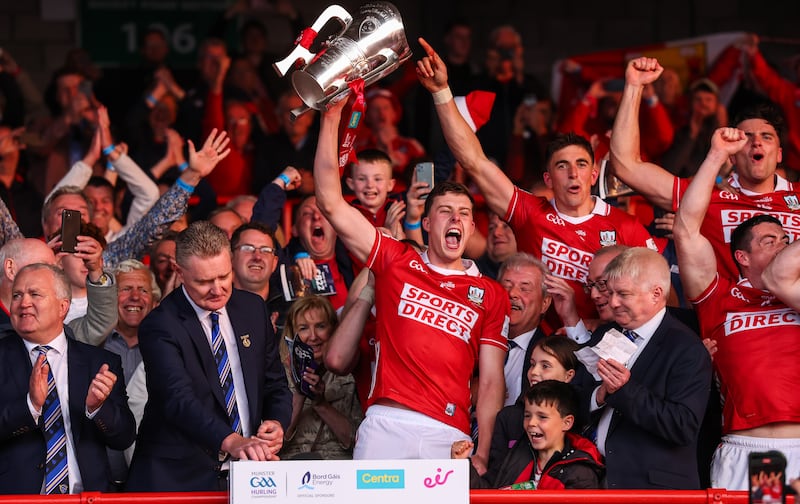 Cork's Robert Downey lifts the Mick Mackey Cup after beating Limerick at the Gaelic Grounds. Photograph: James Crombie/Inpho