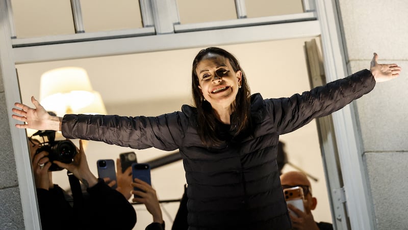 Nobel peace laureate Maria Corina Machado greets supporters from the balcony of the Grand Hotel in Oslo, Norway, early on December 11th. Photograph: Odd Andersen/ AFP via Getty Images