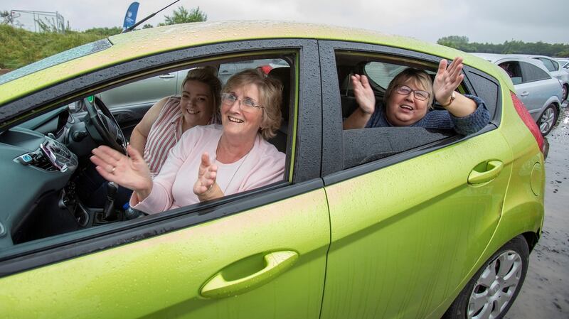 Drive-in revellers, who have packed a football ground for Northern Ireland’s first drive in country music concert at Ballymena Showgrounds in C  Antrim. PA Photo.  Photograph: Paul Faith/PA Wire