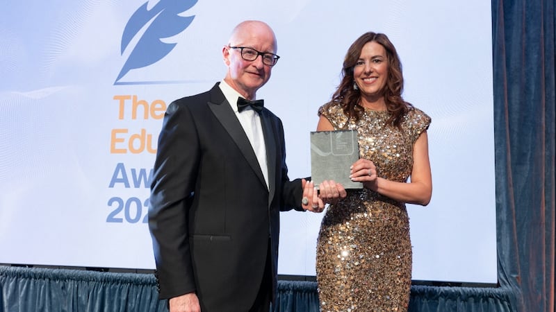 Bertie Kelly, awards judge, presents the best student campus award to Laura Ryan, University of Limerick