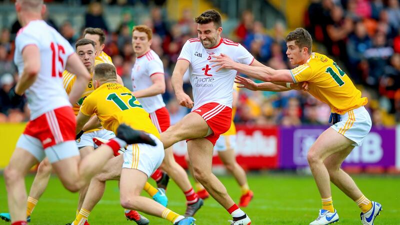 Tyrone’s  Tiernan McCann scores a goal against outclassed Antrim in the Ulster championship. Photograph: Tommy Dickson/Inpho