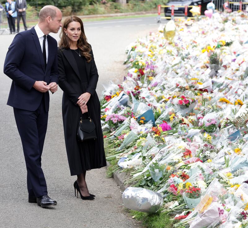 Prince William, Prince of Wales and Catherine, Princess of Wales view floral tributes at Sandringham on September 15, 2022 in King's Lynn, England. The Prince and Princess of Wales were visiting Sandringham to view tributes to Queen Elizabeth II, Photograph: Chris Jackson/Getty Images