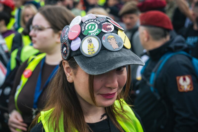 A student displays her 'protest' badges at a student demonstration against the pro-government broadcaster Informer in Belgrade last month. Photograph: Andrej Isakovic/AFP via Getty Images       