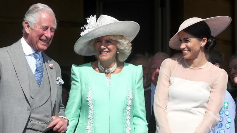 Right royal knees-up: Prince Charles, his wife, Camilla, and their new daughter-in-law, who has married into one of the most conservative, classist and wealthy families on the planet. Photograph: Chris Jackson/Getty