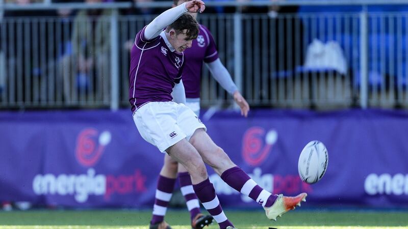 David Wilkinson kicks a penalty during Clongowes Wood’s win over Castleknock. Photograph: Laszlo Geczo/Inpho