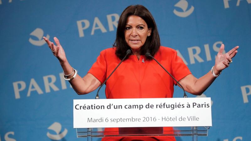 The Mayor of Paris Anne Hidalgo  announces the opening of the city’s first refugee camp by mid-October. Photograph: Francois Guillot/AFP/Getty Images