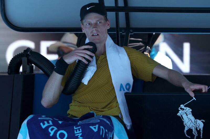 Jannik Sinner uses a cooling tube between games against Eliot Spizzirri during their men's singles match. Phhotograph: David Gray/AFP via Getty Images