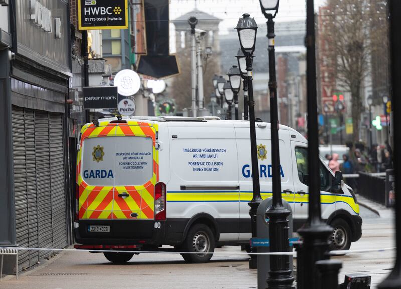 Garda forensic collision investigators at the scene of a bus crash on North Earl Street in Dublin on Thursday. Photograph: Sam Boal/Collins Photos 