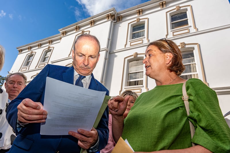 Antoinette Burke confronted Micheál Martin in September 2025 over delays in treatment for her daughter Katie Byrne, who lives with cerebral palsy. Photograph: Noel Sweeney/PA