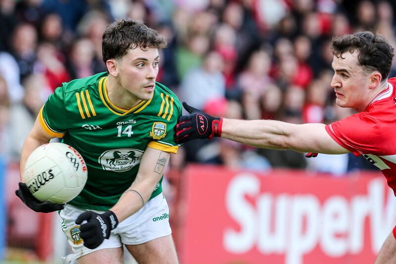 Meath’s James Conlon evades the challenge of Derry’s Diarmuid Baker. Photograph: Lorcan Doherty/Inpho
