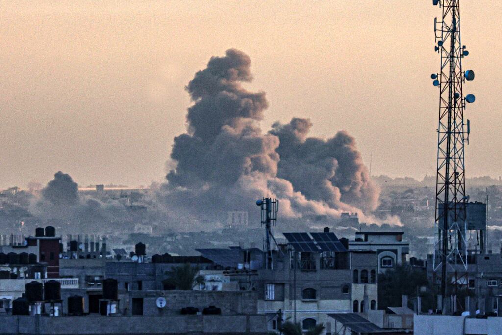 Smoke billowing over Khan Yunis in the southern Gaza Strip during Israeli bombardment, as the war between Israel and the Palestinian militant group Hamas enters its 100th day. Photograph: Getty Images