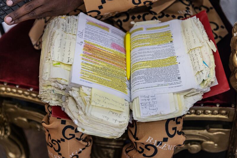 Bishop Lamor Whitehead reviews his bible at his church in Brooklyn. Photograph: Victor J Blue/The New York Times