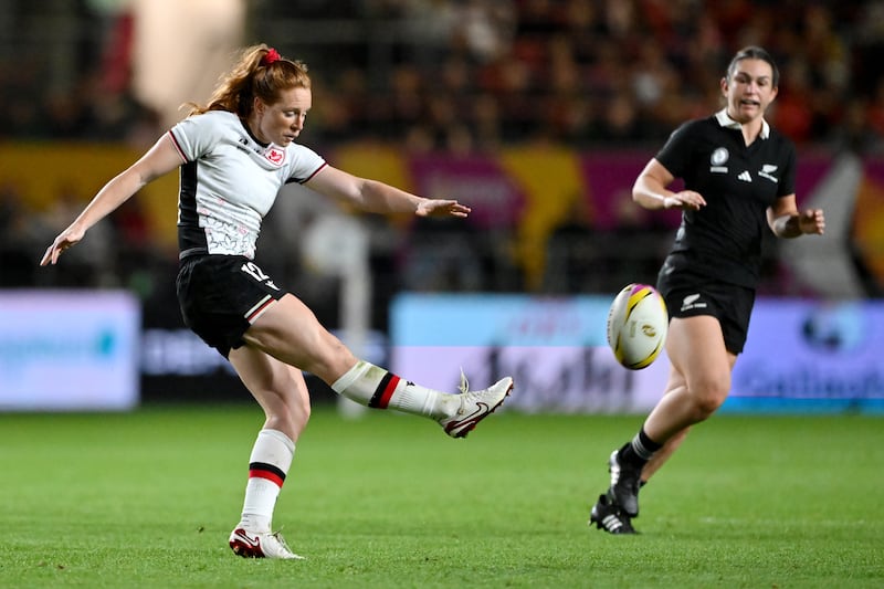 Alex Tessier of Canada kicks the ball clear upfield. Photograph: Dan Mullan/Getty