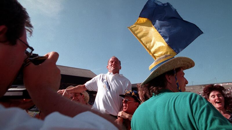 Clare manager Ger Loughnane celebrates with fans after the All-Ireland SHC semi-final against Galway in 1995. Photograph:  Lorraine O’Sullivan/Inpho