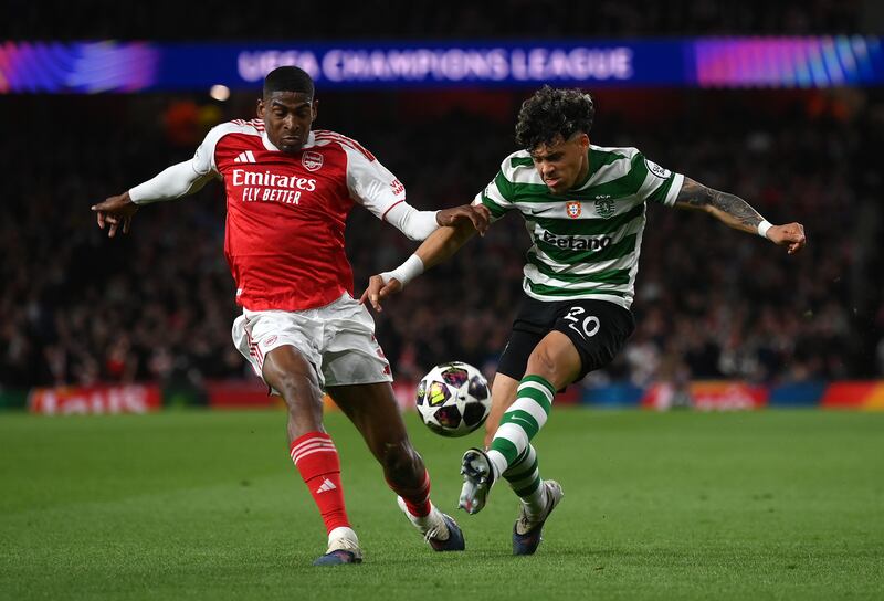 Sporting's Maximiliano Araujo is challenged by Arsenal's Cristhian Mosquera. Photograph: Mike Hewitt/Getty Images