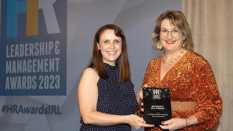 Michelle Ryan, awards judge, presents the most innovative use of technology award to Susan Hynes, Valeo Foods Ireland