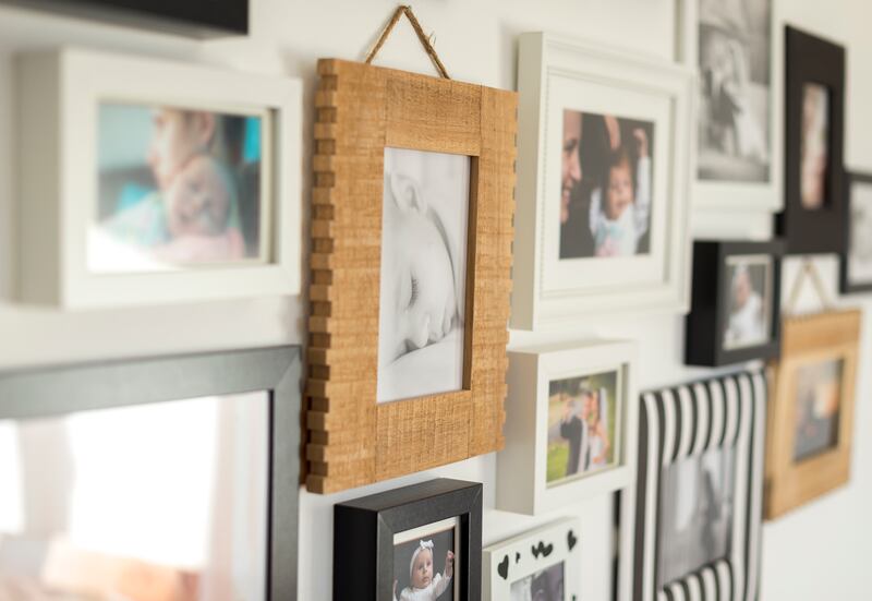 Don't get rid of items to which your adult child is emotionally attached, like old photographs and toys, before checking with them. Photograph: Ondrooo/iStock