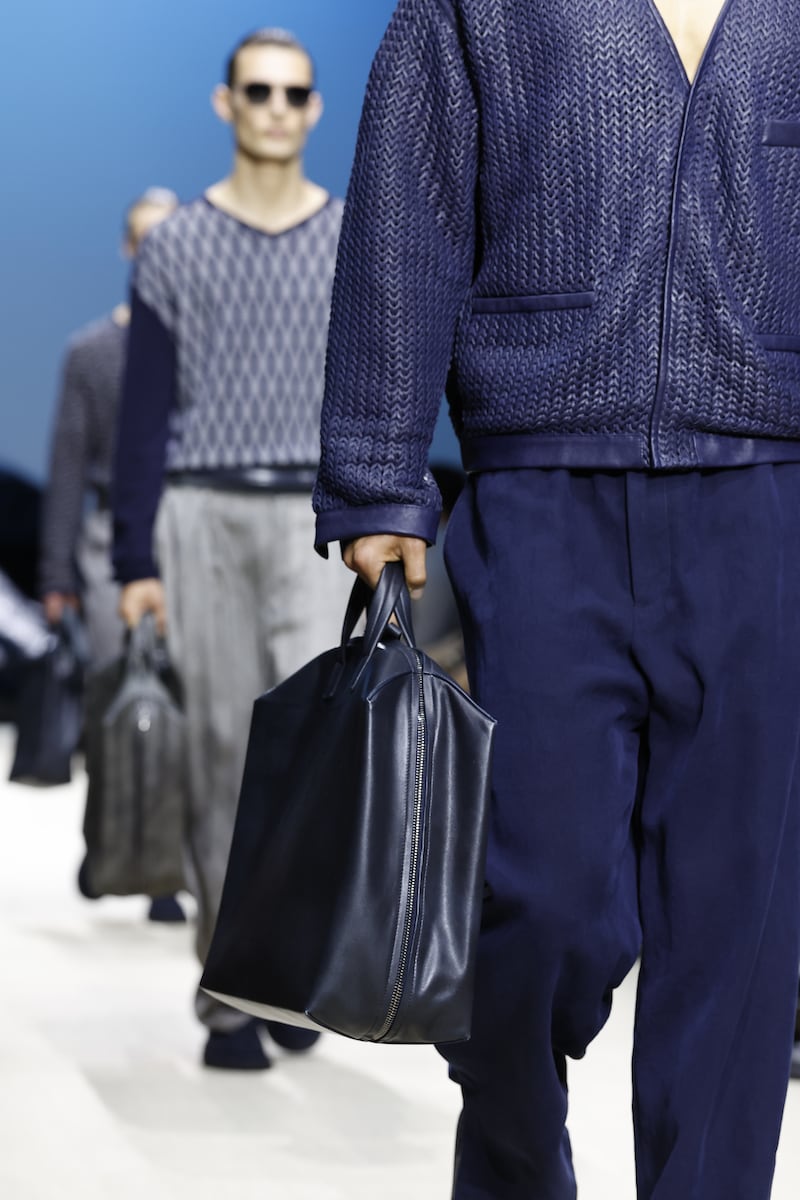 Models with man bags as part of Milan Men's Fashion Week on June 23, 2025. Photograph: Aitor Rosas Sune/WWD via Getty Images