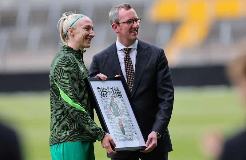 FAI chief executive officer David Courell makes a presentation to Louise Quinn ahead of her final Ireland cap. Photograph: Ryan Byrne/Inpho