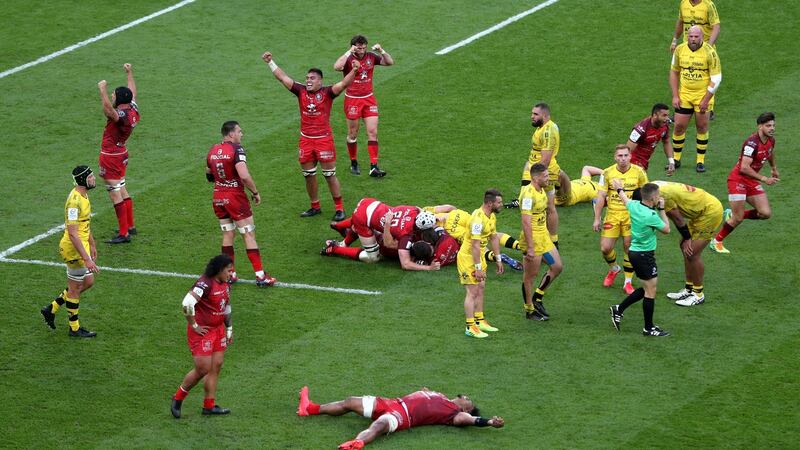 Toulouse players celebrate at the final whistle of their Champions Cup final win over La Rochelle. Photograph:  David Davies/PA