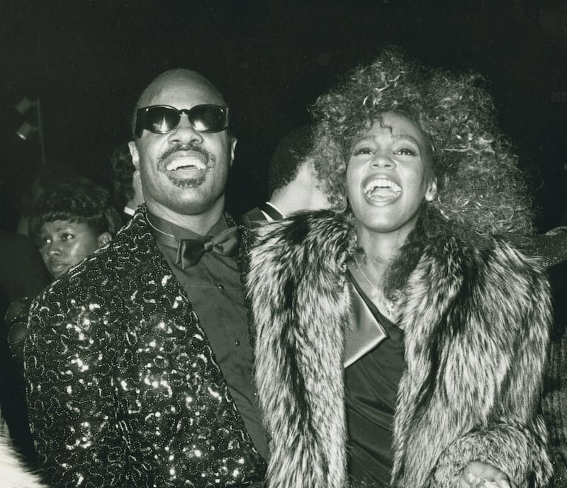 Stevie Wonder and Whitney Houston at the American Music Awards in 1986