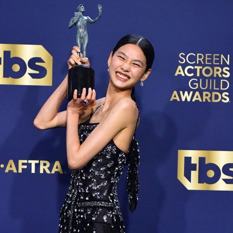South Korean actor Jung Hoyeon poses with the award for outstanding performance by a female actor in a drama series for Squid Game. Photograph: Frederic J Brown/AFP via Getty