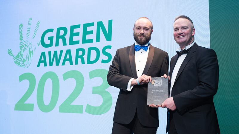 Ryan Munnelly, Go Green Champion, LinkedIn, presents the Green Public Sector Organisation of the Year award to Sean Laffey, Uisce Éireann.