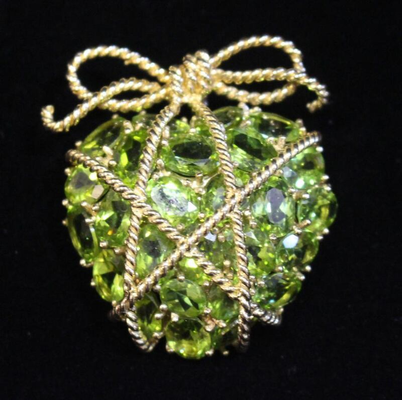 Hegarty’s Auction Rooms,  Co Cork. Lot 70, a gold pendant with 26 oval peridots  in the shape of a heart €4,000-€6,000.