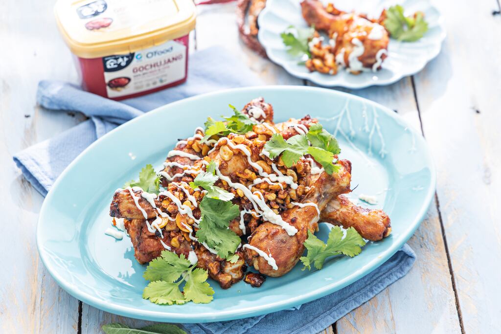 Gochujang chicken drumsticks. Photograph: Harry Weir