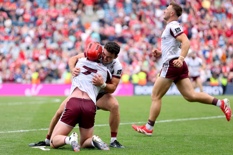 Galway's Ronan Glennon and Shane Morgan celebrate winning the match. Photograph: Ryan Byrne/Inpho