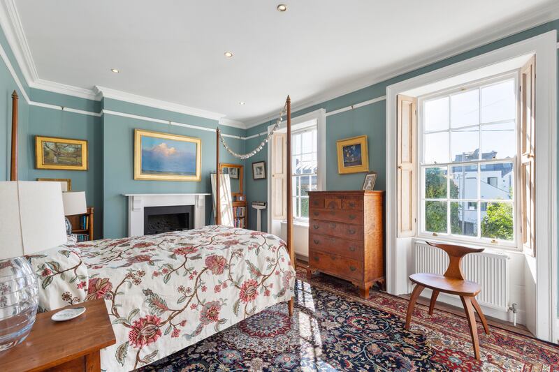 The main bedroom occupies the full width of the house