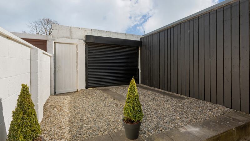 Back garden with vehicular access