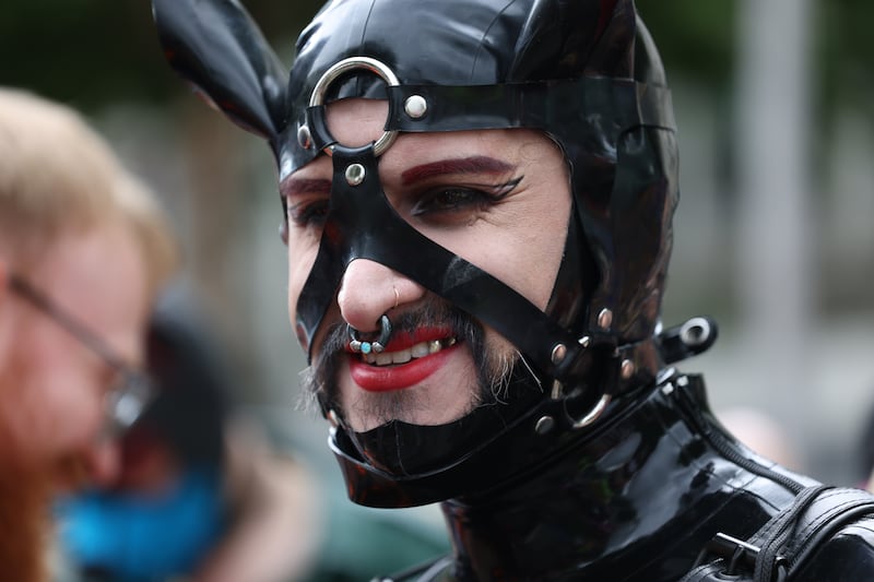 Jaster Dekay, from Miami, Florida, walking with the Irish Leathermen in the Pride Parade in Dublin City centre. Photograph: Bryan O’Brien 