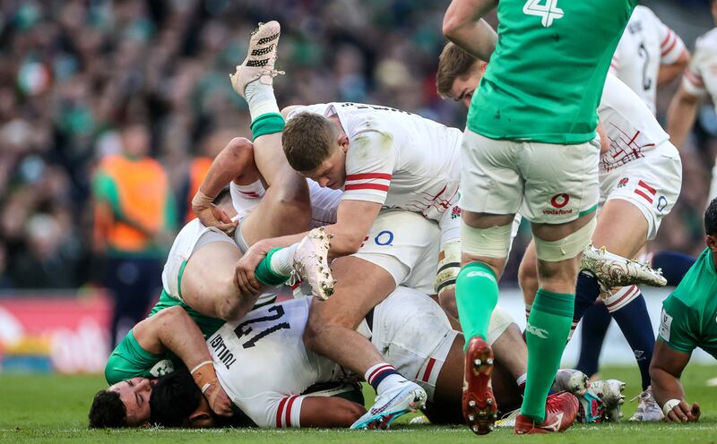 England’s Manu Tuilagi is tackled by Robbie Henshaw of Ireland during the Guinness Six Nations match at the Aviva Stadium. Photograph: 
James Crombie/Inpho