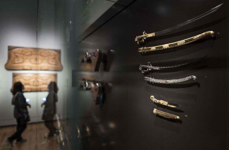 Two sabers (kastanes), a ceremonial sword from Sri Lanka and a knife (pita-kaetta), on display at the Rijksmuseum in Amsterdam, the  Netherlands. Photograph: Freek van den Bergh/ANP/AFP via Getty Images